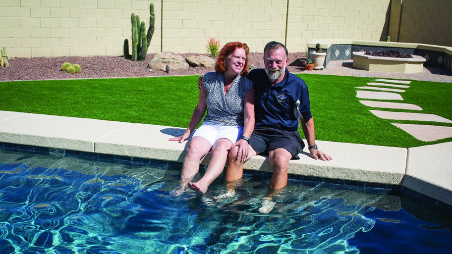 bev and barry baril poolside