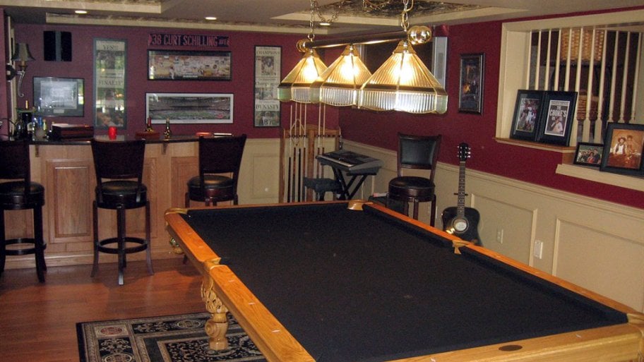 Basement with wood floor and pool table basement with wood floor and pool table