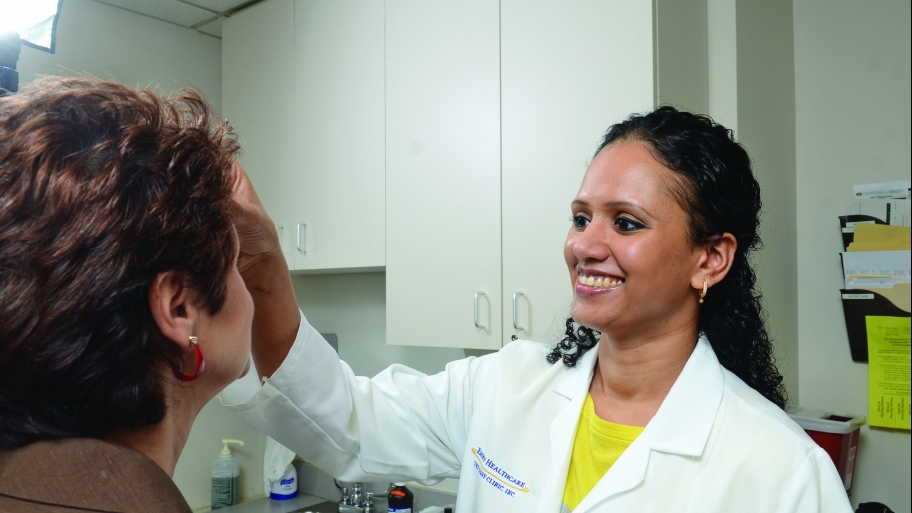 dermatologist checking a patient