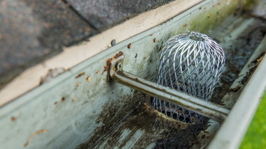 What Should You Do When Your Gutter Downspout Gets Clogged Guaranteed Gutters