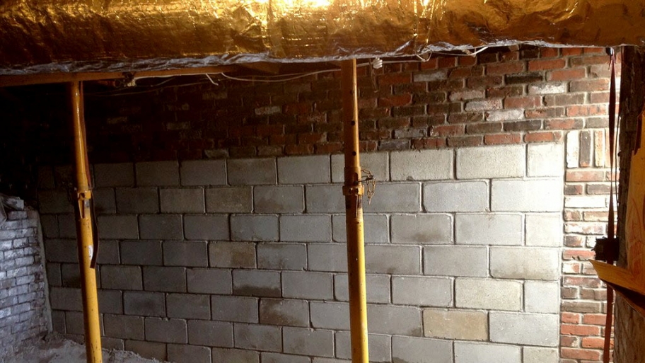 A home's foundation is repaired