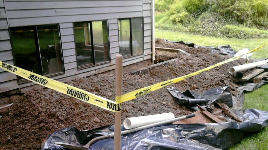 drainage foundation repair work on house