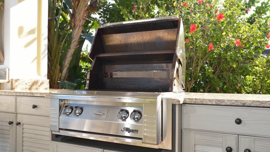Gas grill in an outdoor kitchen