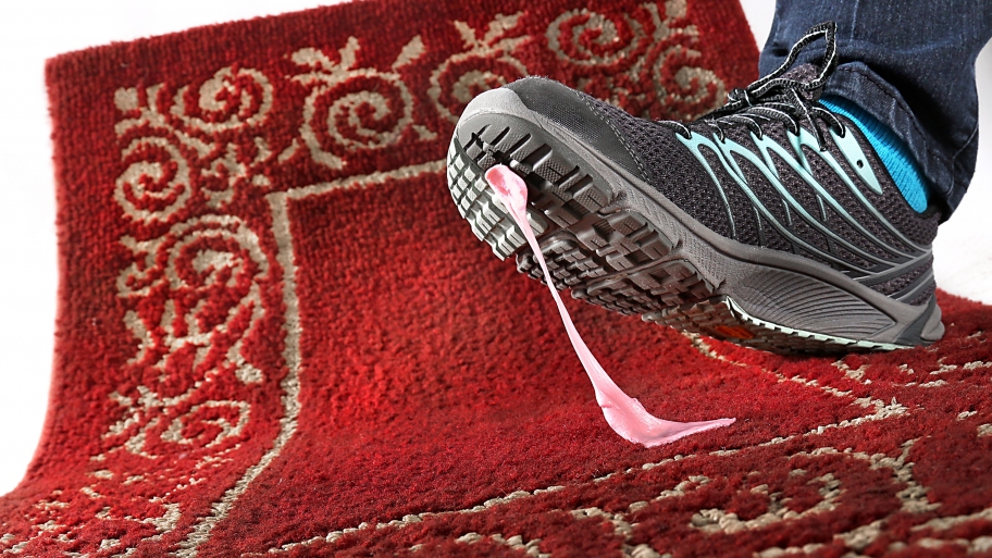gum stuck to a shoe and rug