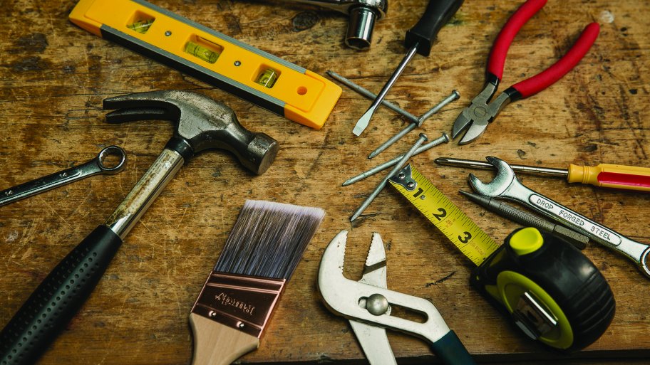 handyman tools, hammer, paint brush, pliers