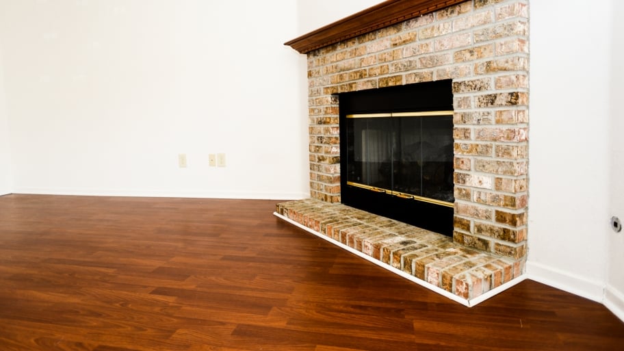 hardwood flooring and fireplace