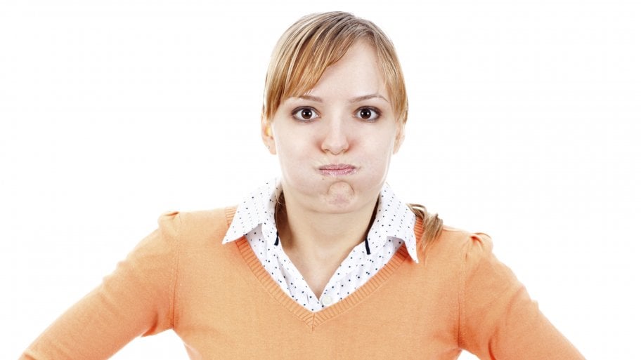 A woman holds her breath to cure hiccups.