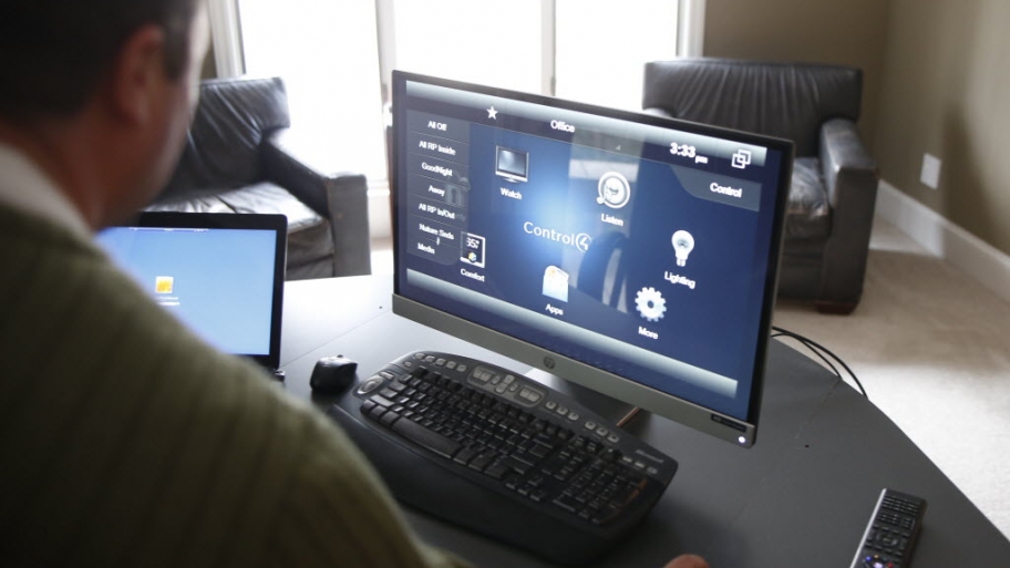 A man sits at a computer