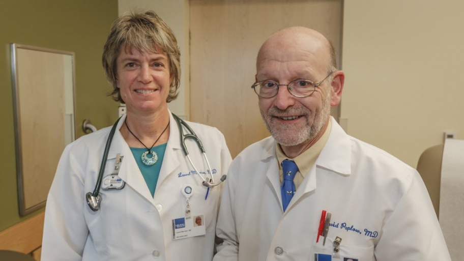 Two doctors standing side-by-side