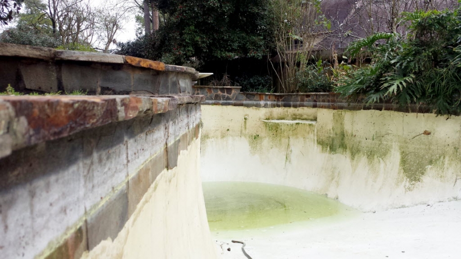 How Much Do Pool Repairs Cost Angie S List A Drained Pool With Cloudy Water And Algae Buildup Stains On The Wall
