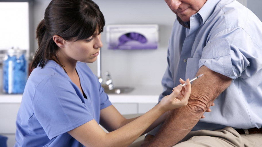 Man receives a shot