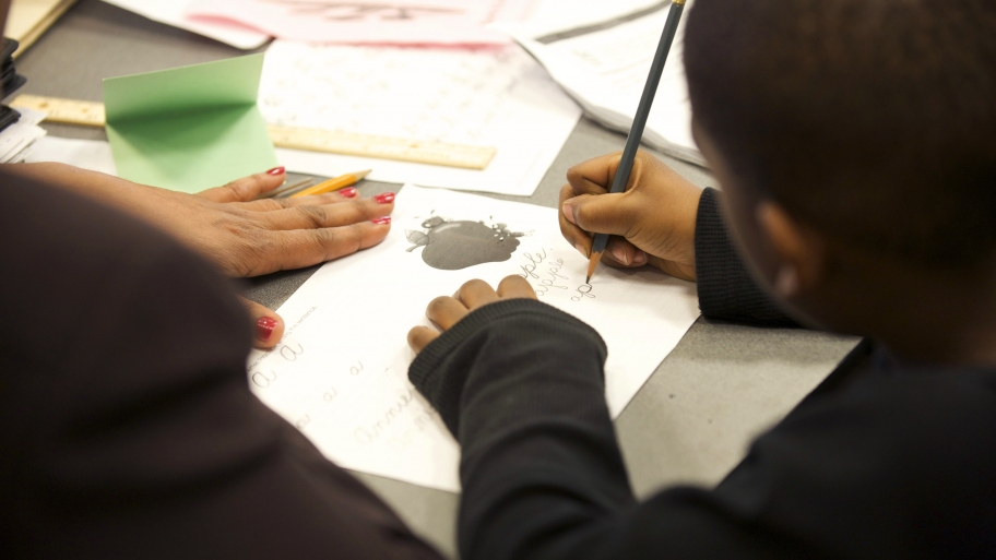tutor helping student with spelling