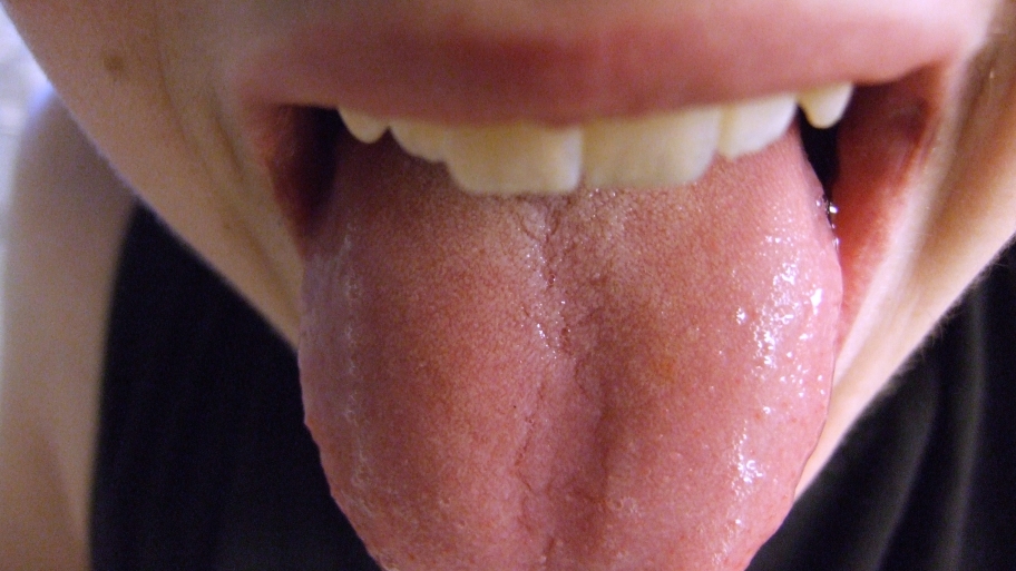 person sticking out tongue
