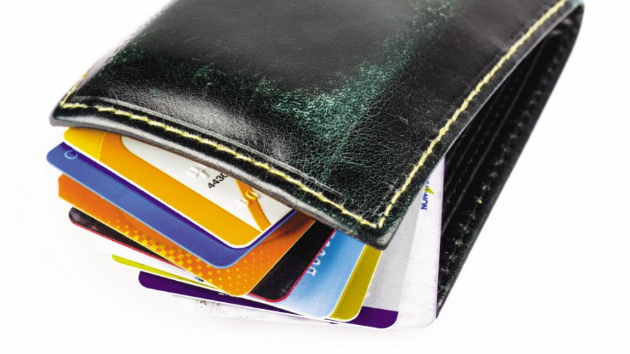 wallet filled with consumer credit cards