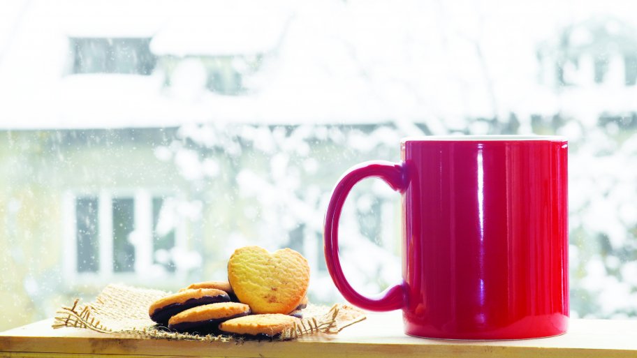 winter window with coffee mug
