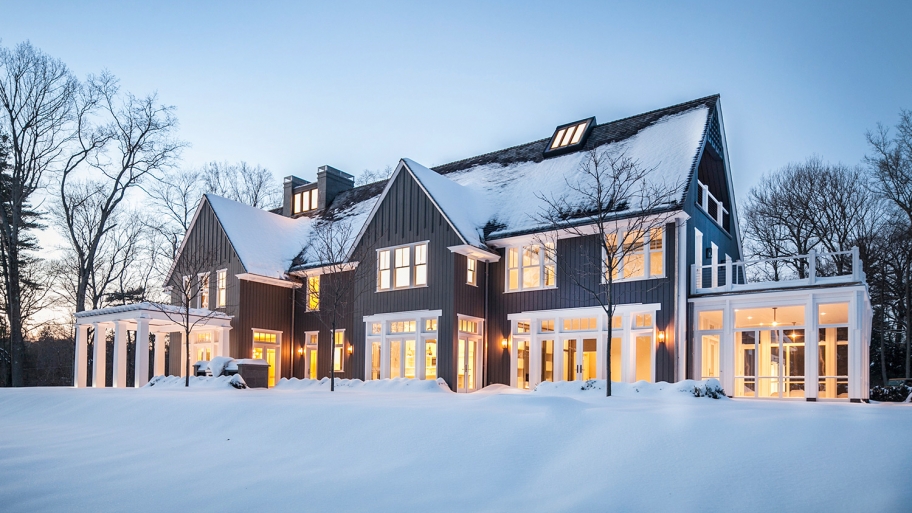house in snowy yard