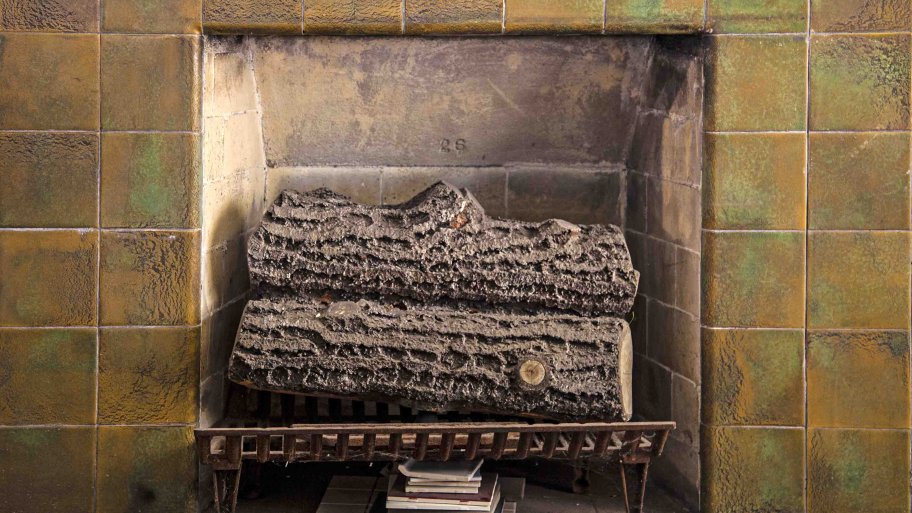 How To Convert A Gas Fireplace Wood Burning Angie S List Stack Of Split Logs In Fireplace A Woodburning