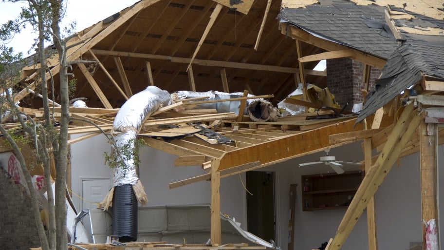 storm-damaged home