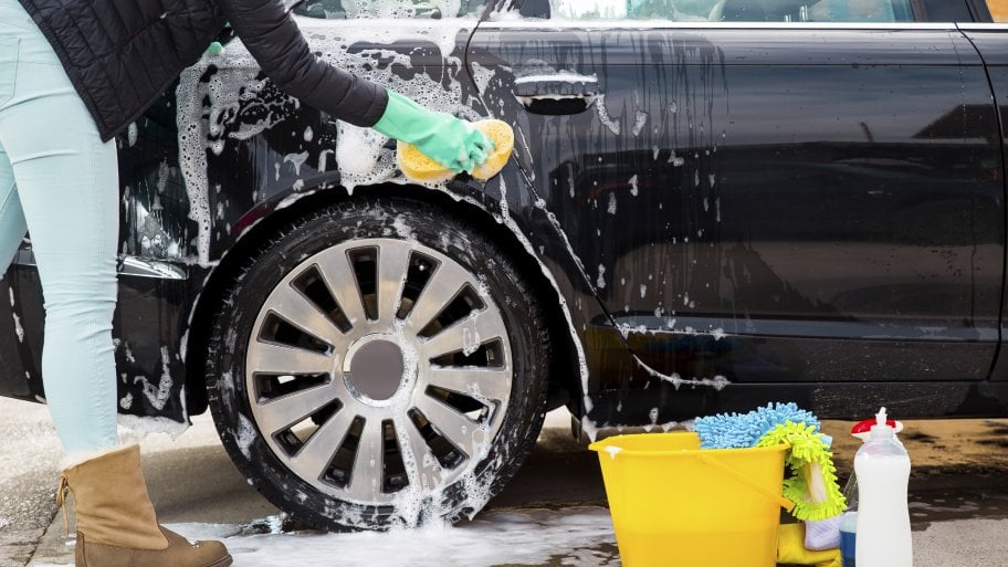 Woman washing car