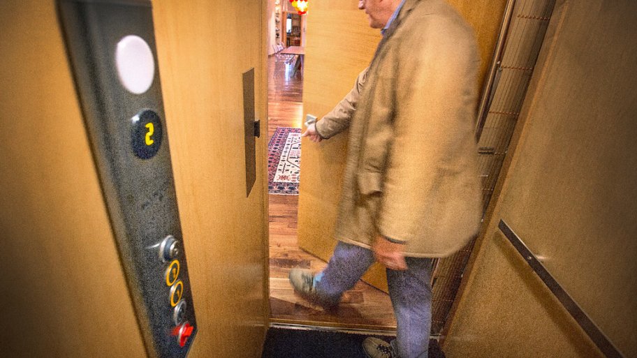 The Lowdown On Installing A Home Elevator Angie S List Man Exiting His Home Elevator