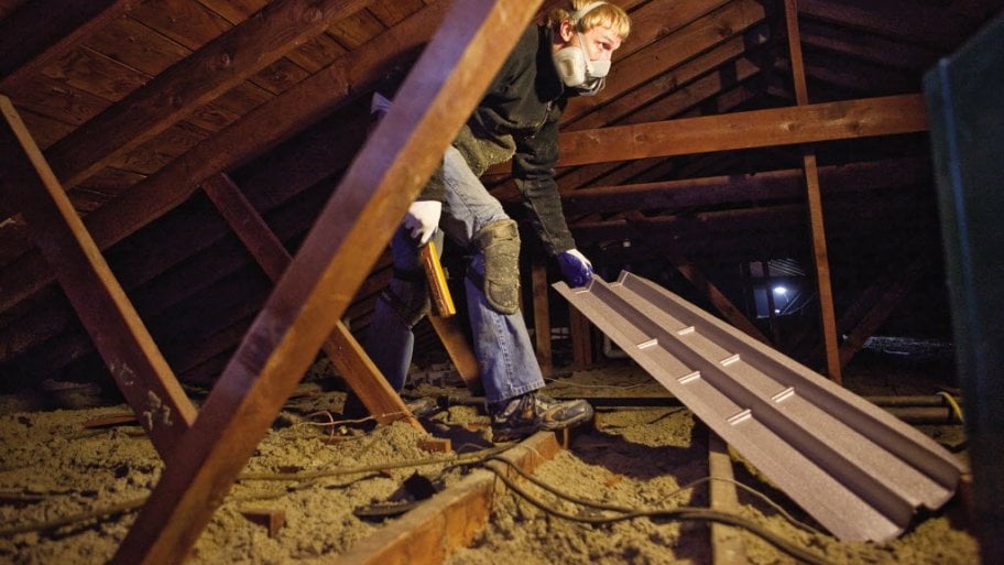 What Does A Home Insulation Upgrade Cost Angie S List Insulation Professional Working In Attic