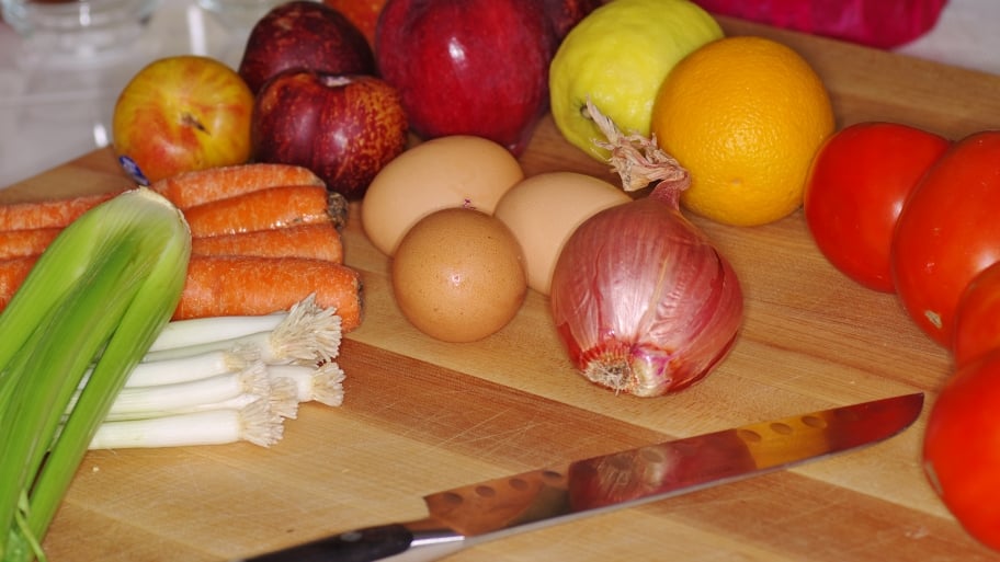 fruits and vegetables on cutting board