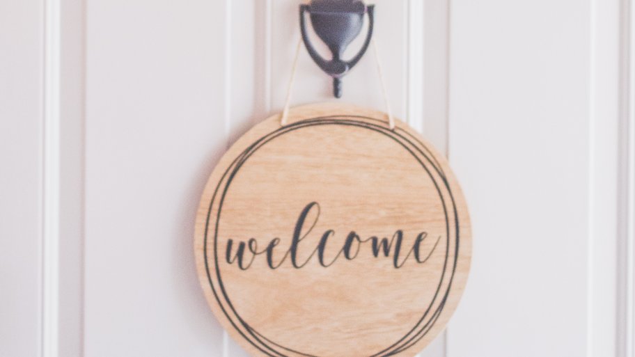 welcome sign on front door