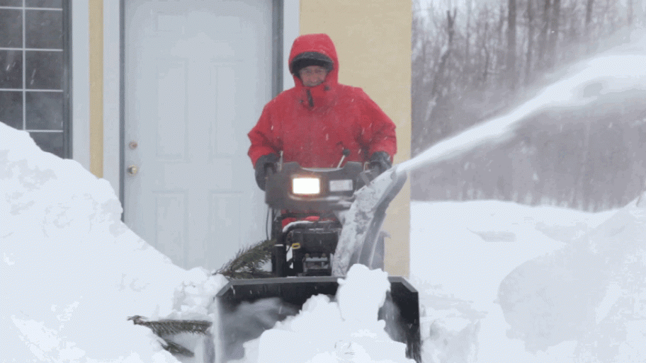 snow blower blowing snow