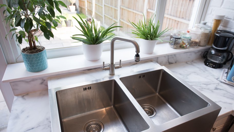 a metal kitchen sink
