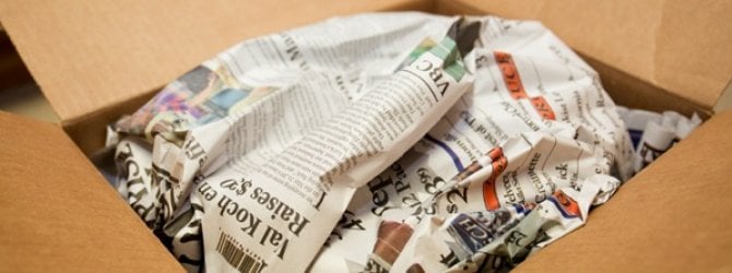 moving box with old newspaper