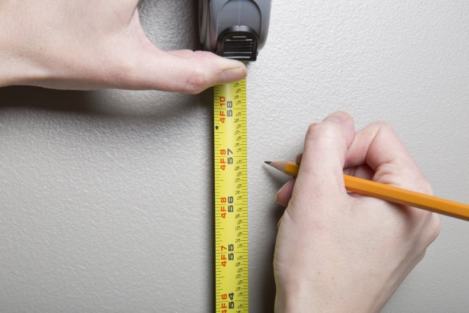 How to hang a picture (Photo by Eldon Lindsay)