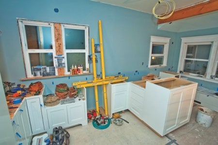 A home improvement project, such as this kitchen, remodel requires various experts. Think carefully before deciding whether to tackle a project yourself. (Photo courtesy of member Andrea S., Seattle)
