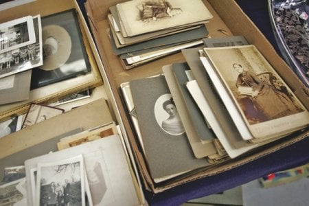 Vintage items and pictures for sale at the live auction in Hebron, Ohio, put on by Craig Connelly Auctioneer. (Photo by Joe Maiorana)