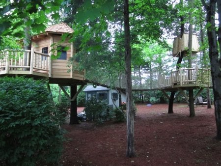 Bridges and rope bridges connect a tree house to multiple platforms. (Photo courtesy of Tree Top Builders, West Chester, Penn.)