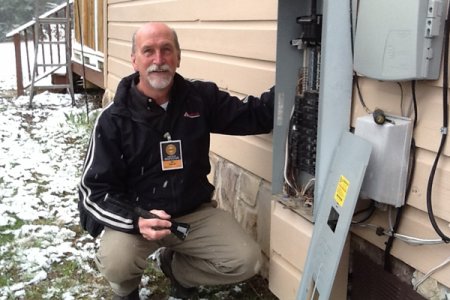 home inspector with electric panel