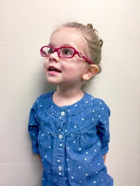 young girl with glasses