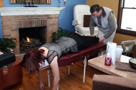chiropractor working on patient