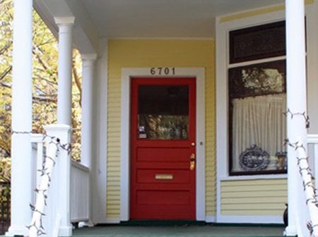 red front door with nice hardware and mailslot