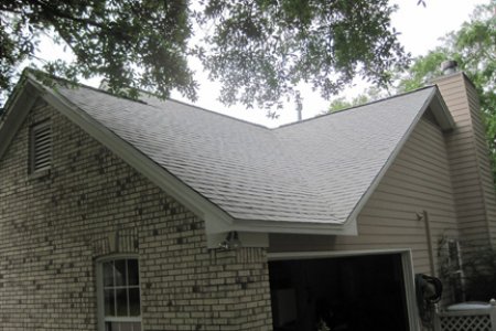 new house roof covered in snow