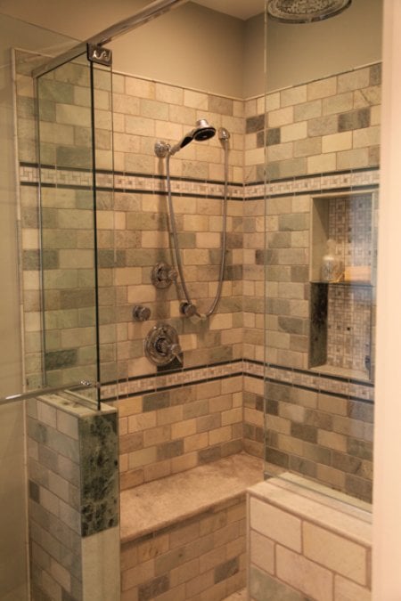 A stone shower with multiple showerheads is one added feature in the Leiches' bathroom. (Photo by Brandon Smith)