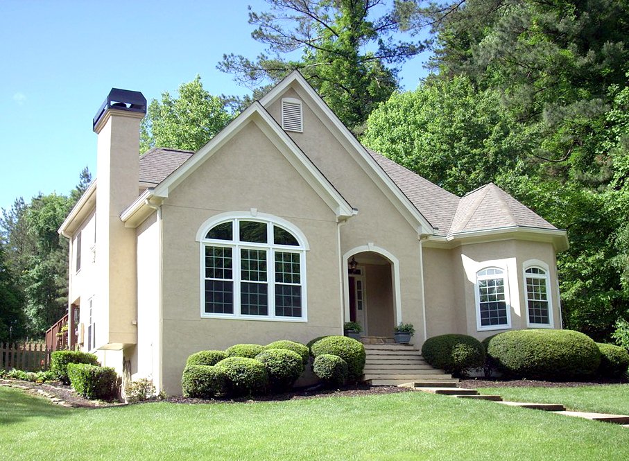 home with neatly landscaped yard
