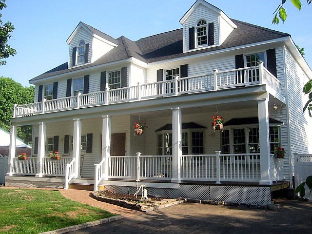 house exterior with multi-level porches