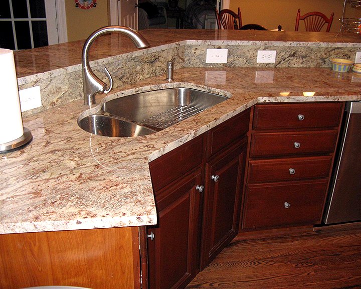 bi-level kitchen island with granite countertops