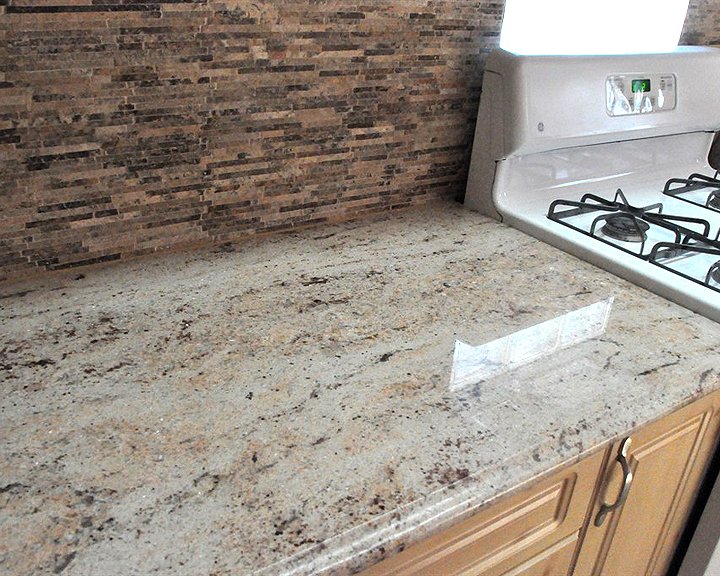 granite countertop and stone backsplash