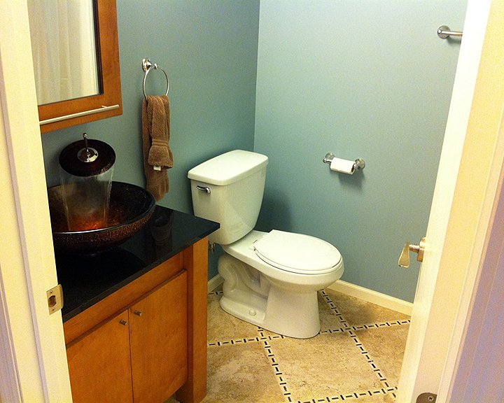 half-bathroom remodel with detail in tile floor