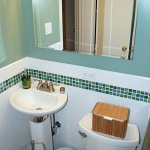 bathroom toilet and pedestal sink