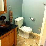 half-bathroom remodel with detail in tile floor