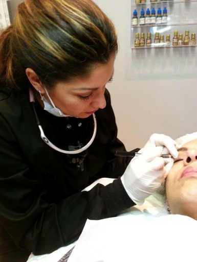 Sandra Caballero applies permanent makeup via a technique called micropigmentation.