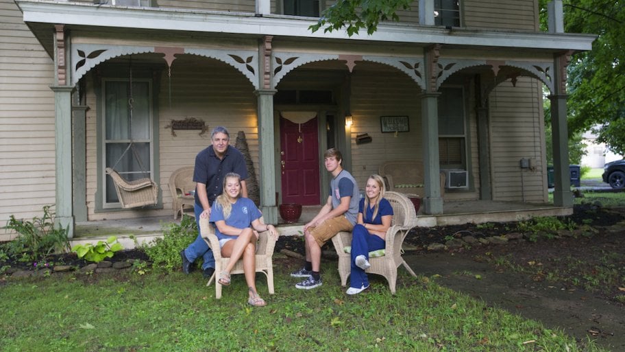 fender family portrait in front of their home