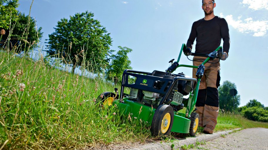 man mowing lawn